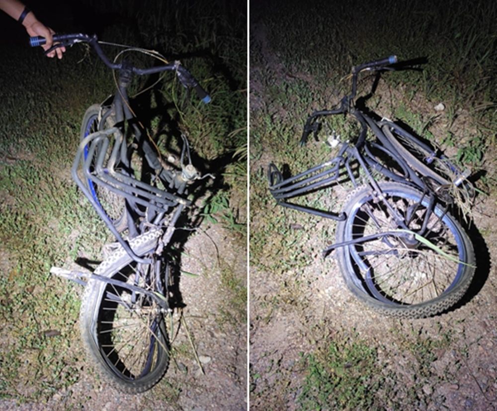 Bicicleta da vítima ficou toda retorcida com o impacto da batida — Foto: Divulgação / PMTO 